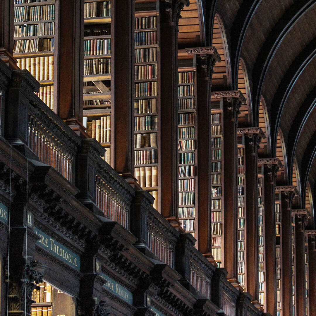 Old double story library full of bookshelves and classic books- Odgers Executive Search Board Headhunters