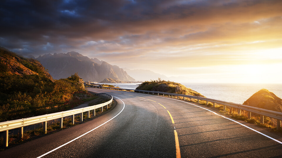 odgers berndtson - long winding road, parallel to the sea and mountain range