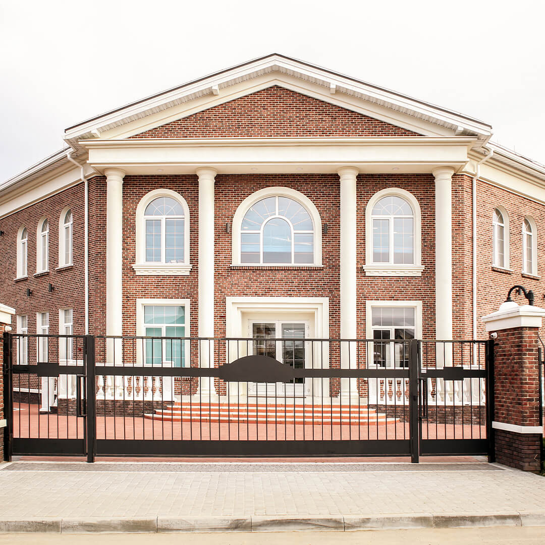 odgers berndtson - facade of red bricked main school entrance building